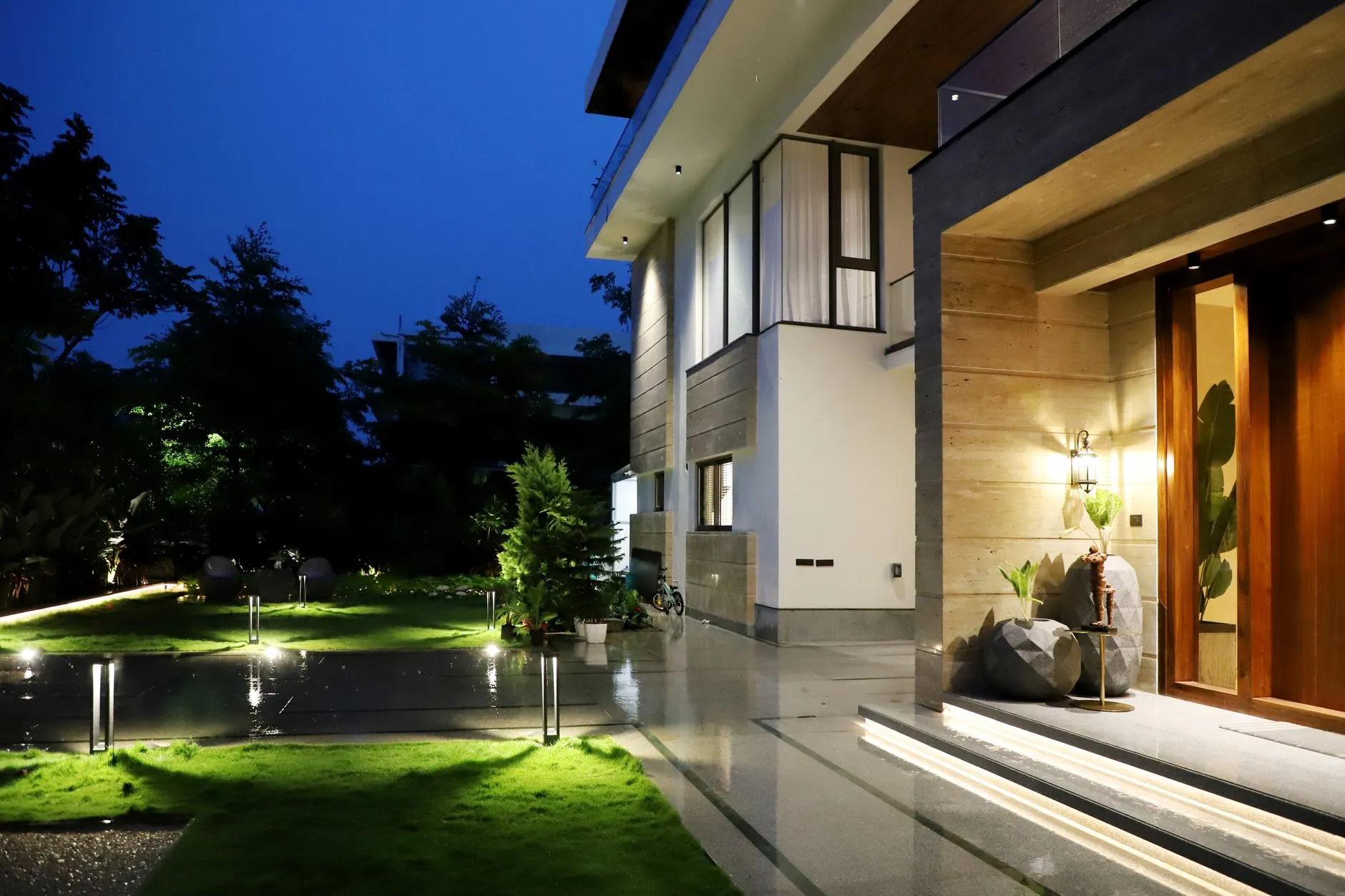 Modern luxurious home exterior at night